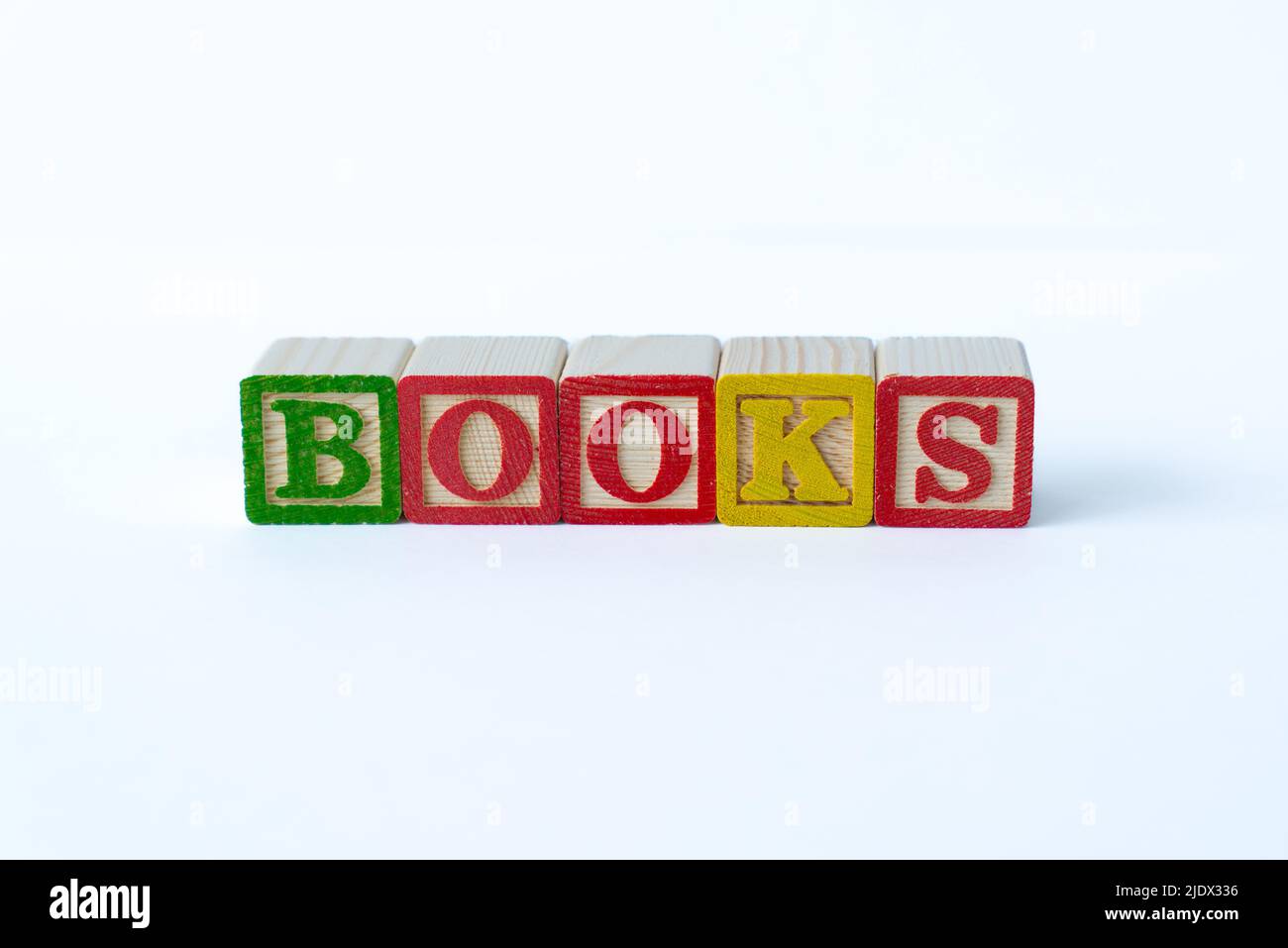 The word Books spelled with colorful toy blocks on a white background Stock Photo