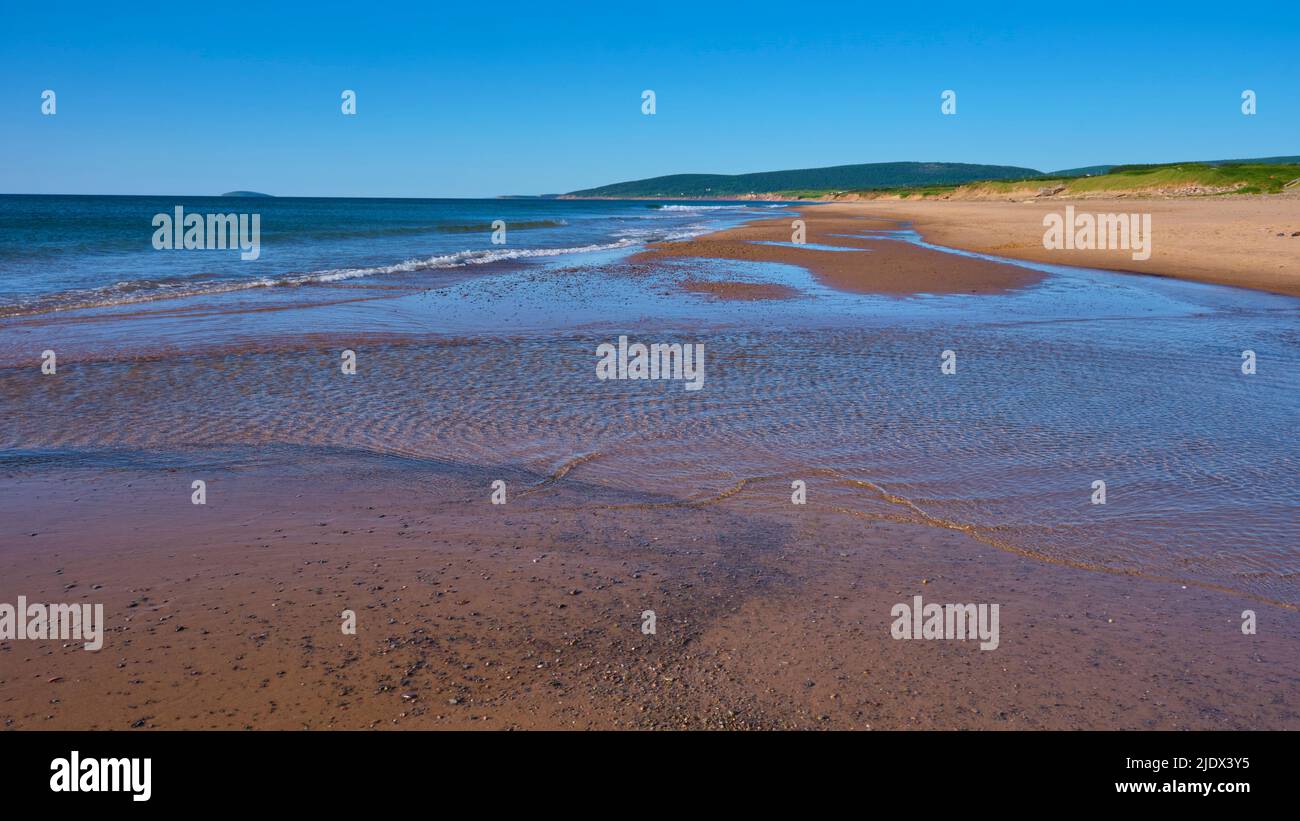 The beautiful beach in Inverness Cape Breton Nova Scotia photographed as the tide goes out. Stock Photo