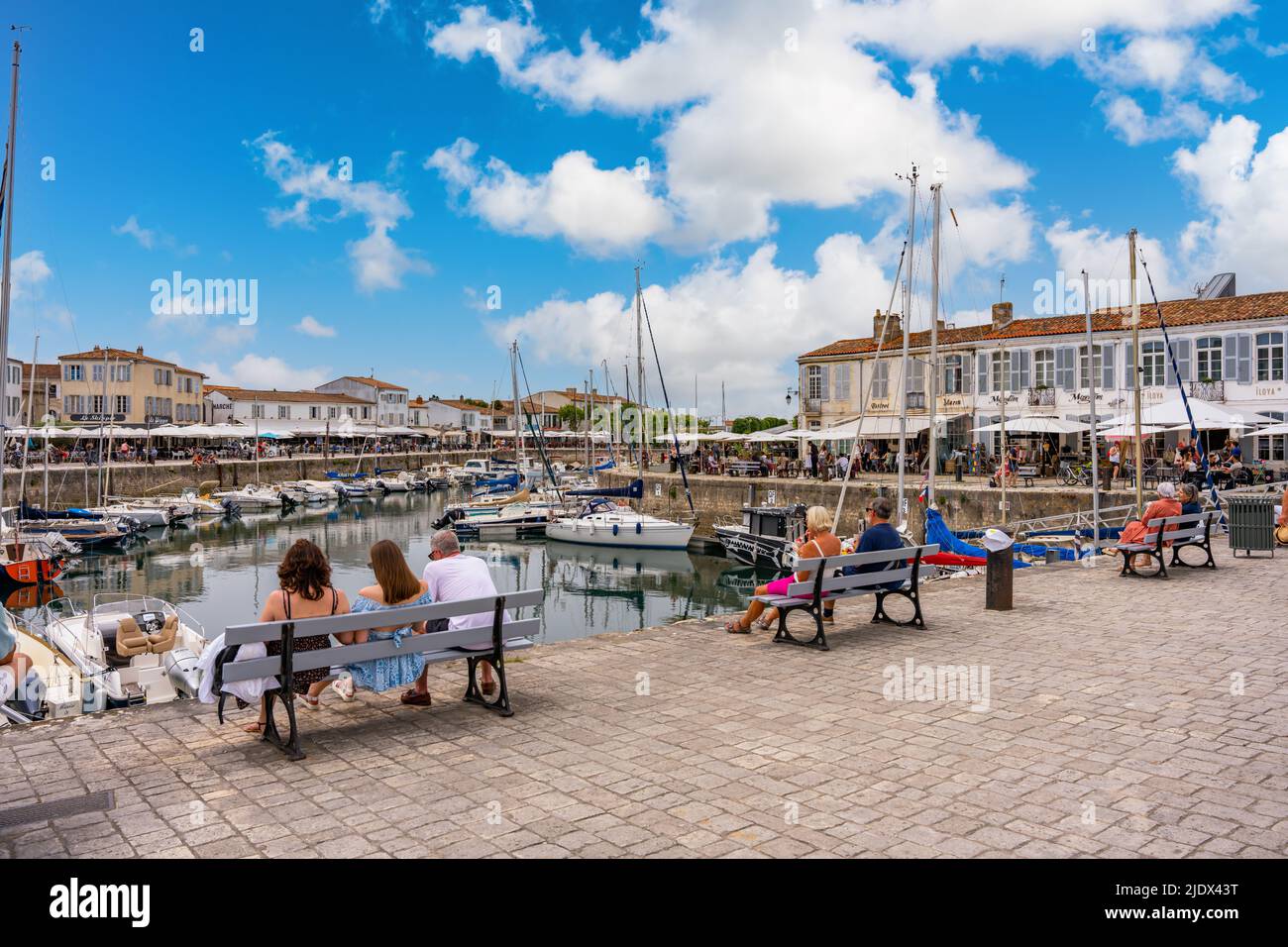 Saint-Martin-de Re, France - May 22th 2022 - Harbour filled with tourists on the Island of Re (Ile de Re) in the Britany part of France Stock Photo