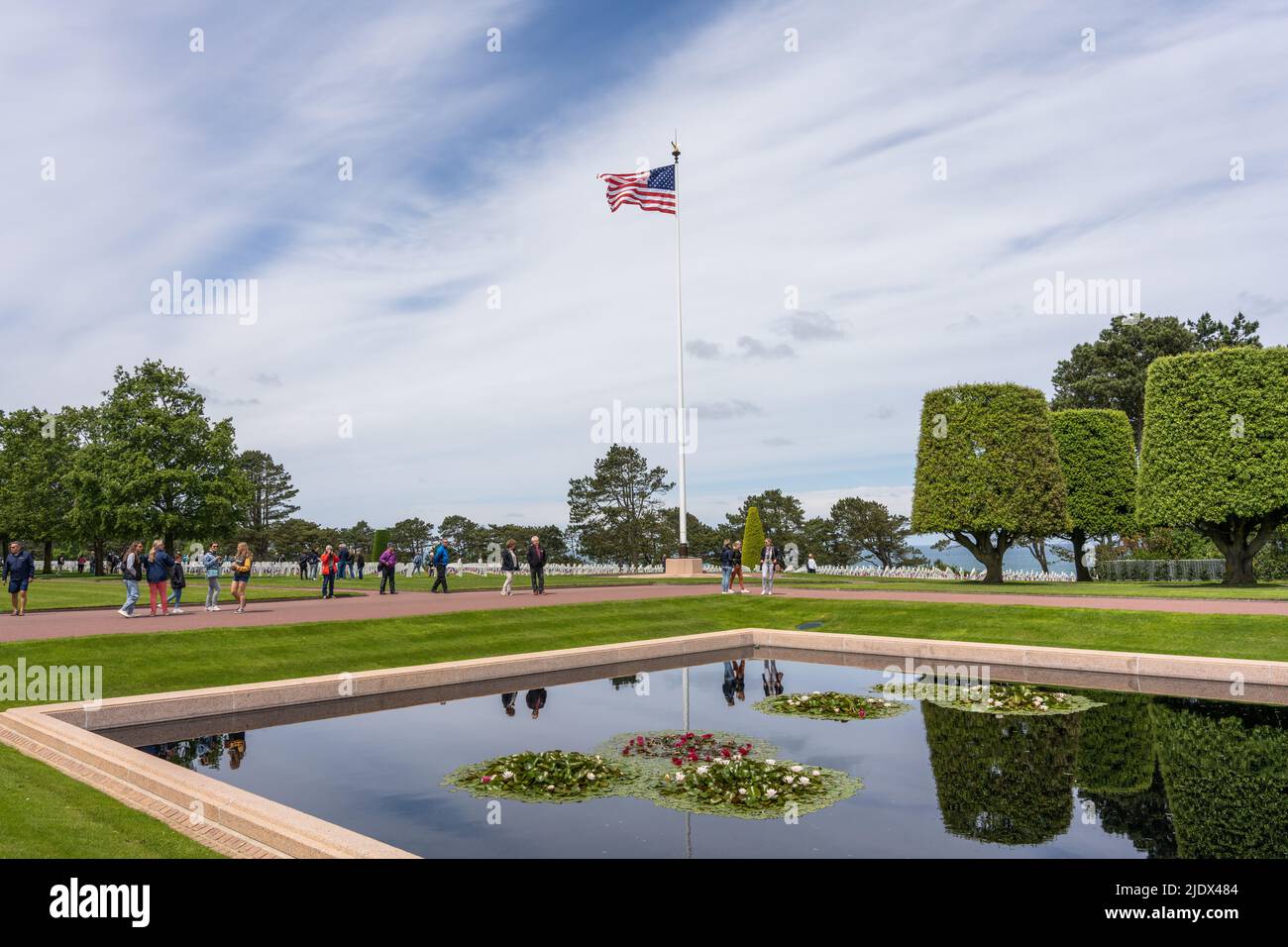 Saint-Laurent-sur-Mer, France - May 29th 2022 - Tourists visiting the Normandy American Cemetery and Memorial at Omaha beach known from D-Day Stock Photo