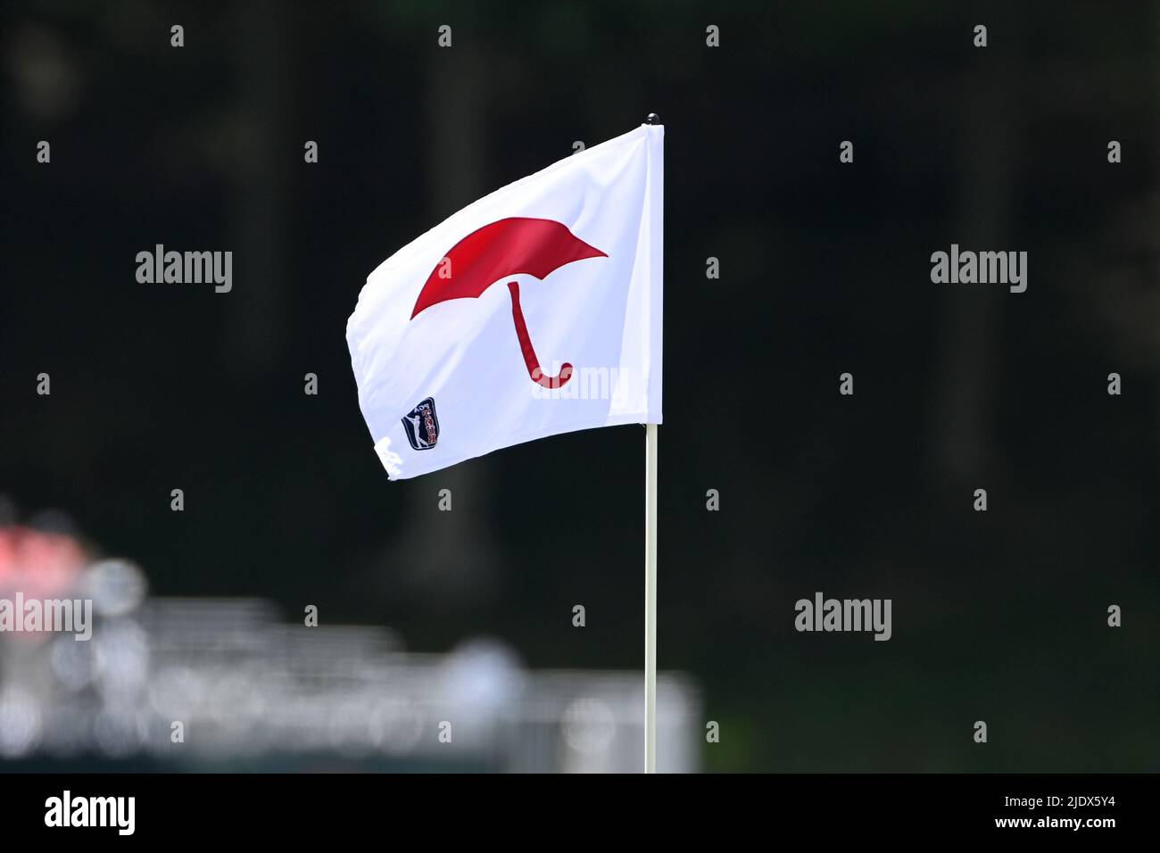 Cromwell CT, USA. 23rd June, 2022. The Travelers Insurance logo on flies in a breeze on the 15th green during the first round of the PGA Travelers Championship golf tournament held at TPC River Highlands in Cromwell CT. Mandatory Credit Eric Canha/Cal Sport Media/Alamy Live News Stock Photo
