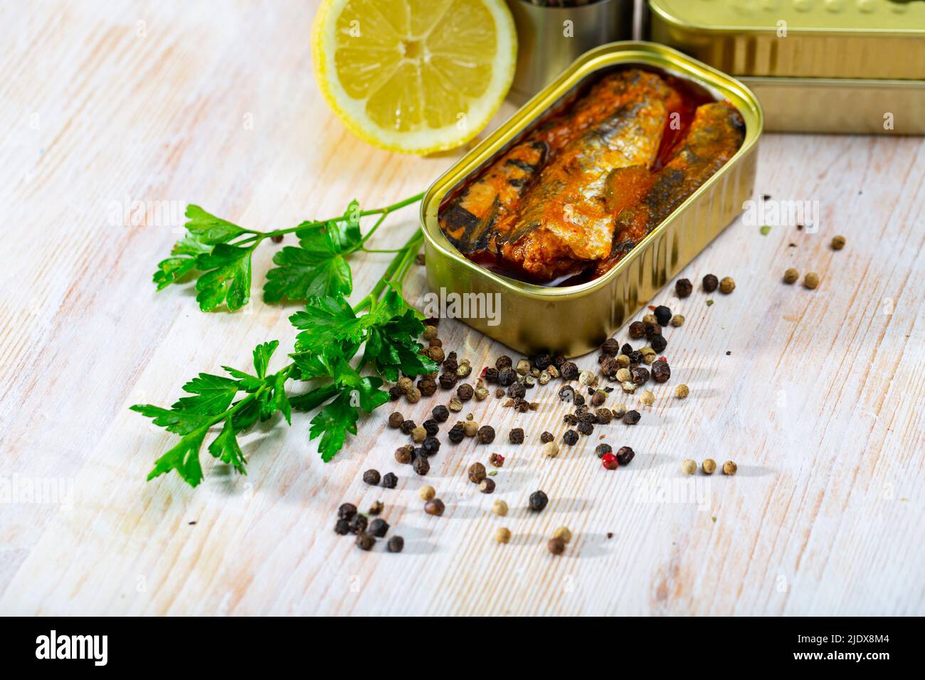 Tin can with smoked sprats, sardines, closeup Stock Photo Alamy