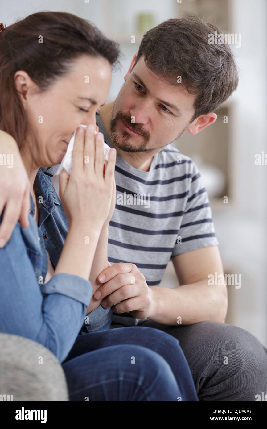 man comforting his frustrated wife Stock Photo