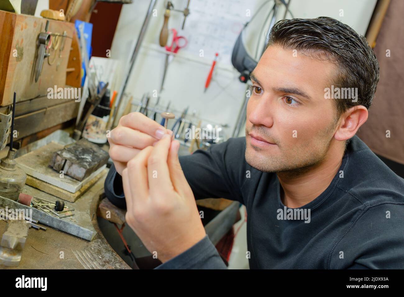 a male young craftsman at work Stock Photo
