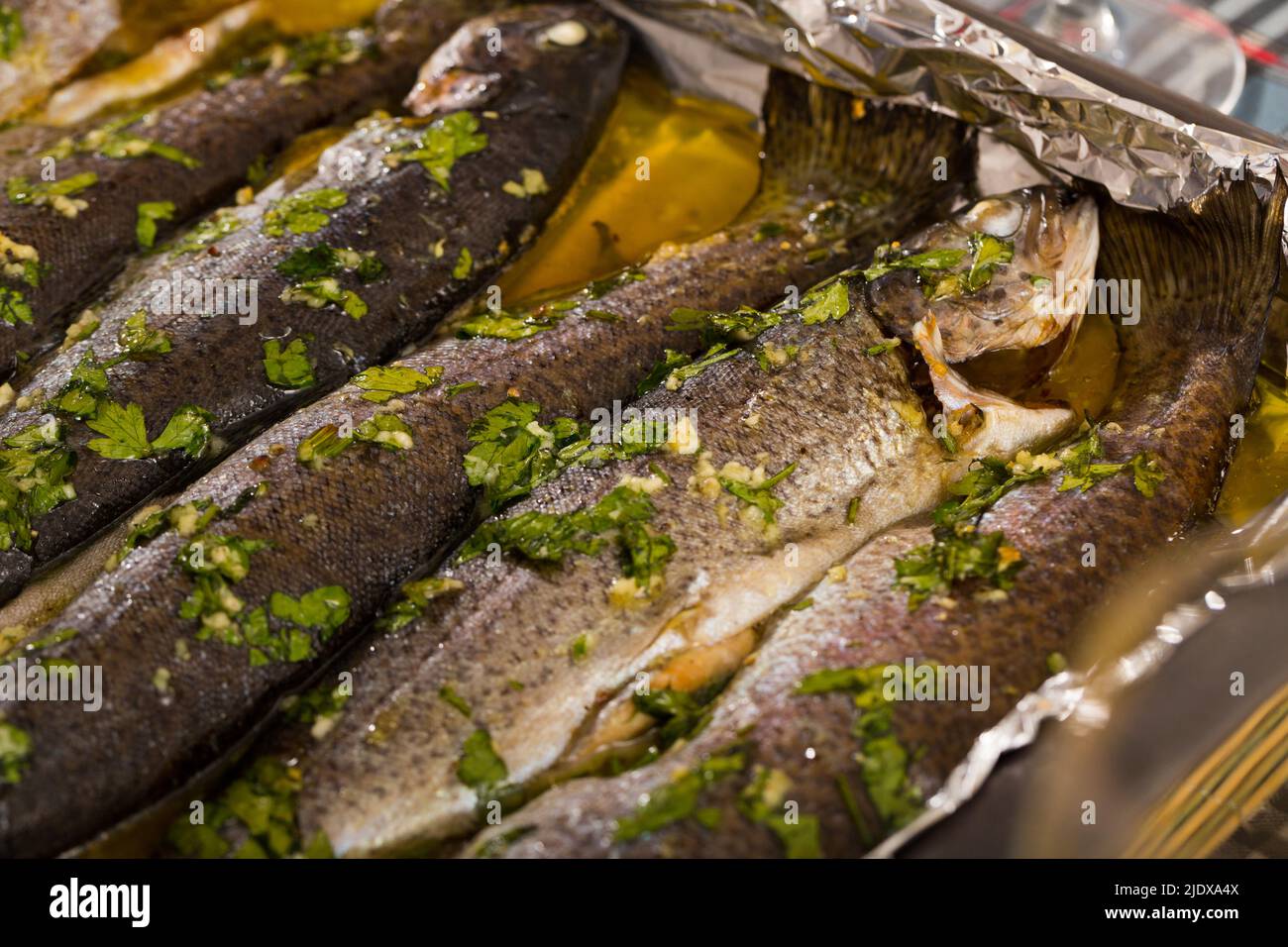 Trout baked in oven Stock Photo Alamy