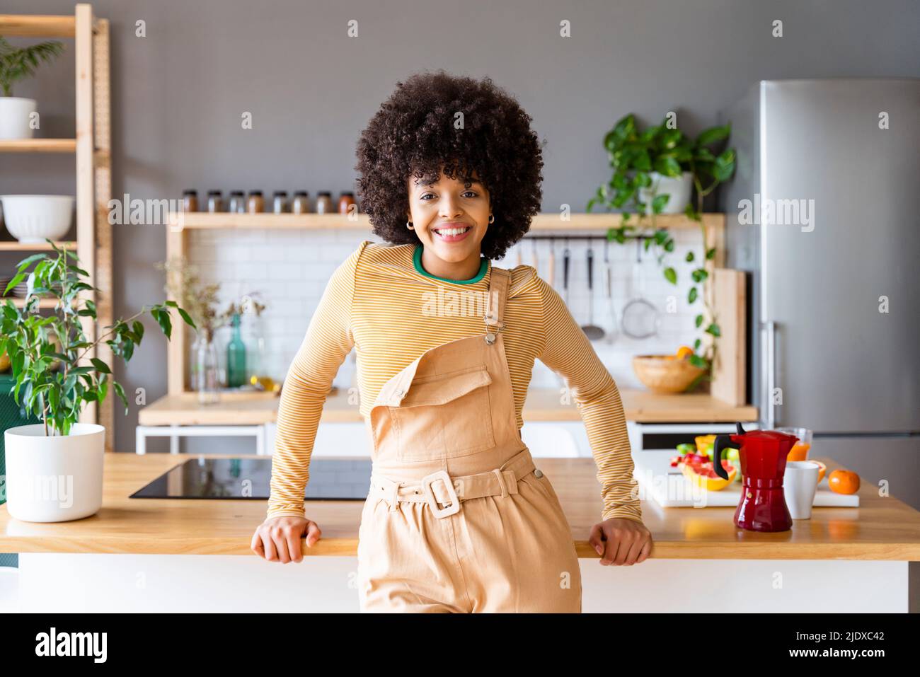 Young afro woman island hi-res stock photography and images - Alamy