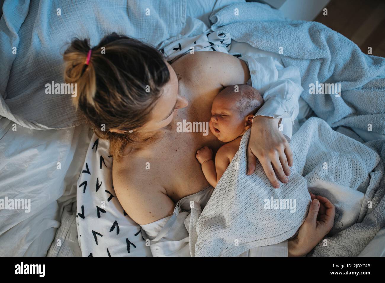 Co sleeping with newborn on chest discount