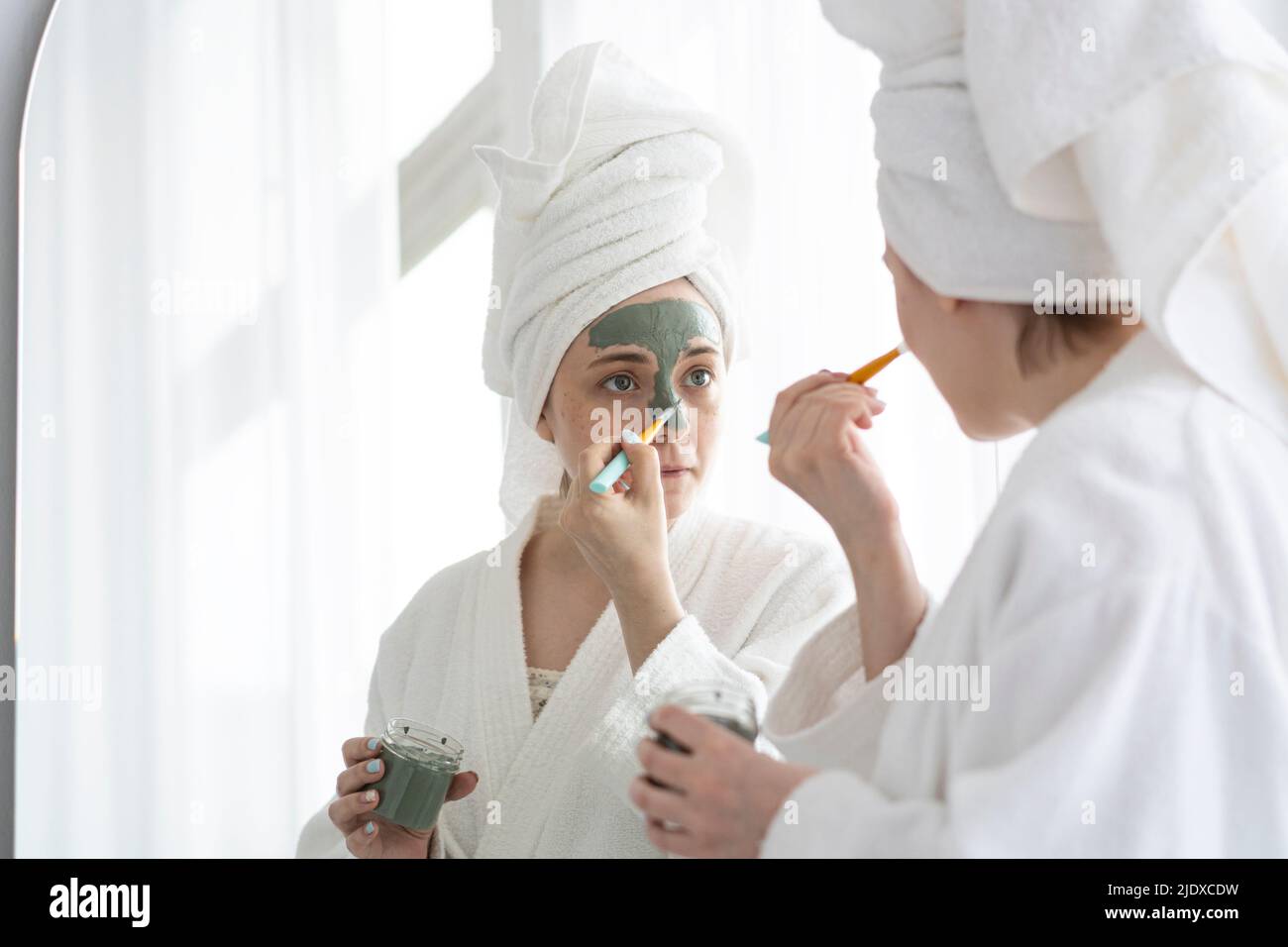 Woman face facial hi-res stock photography and images - Alamy