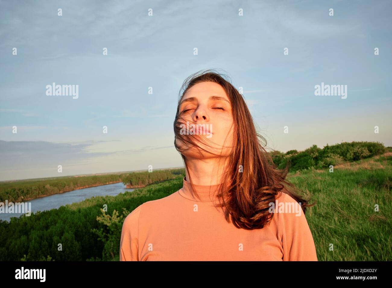 Woman face to the sky eyes closed hires stock photography and images