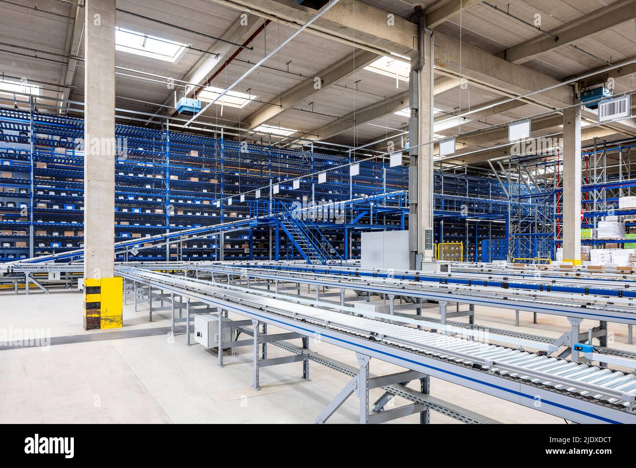 Empty conveyor belt in warehouse Stock Photo