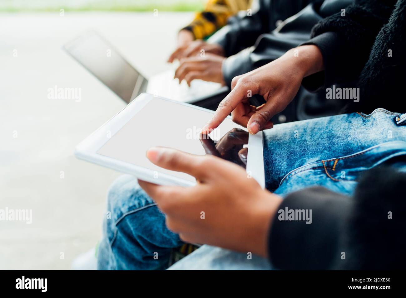 Hands of man using tablet PC Stock Photo