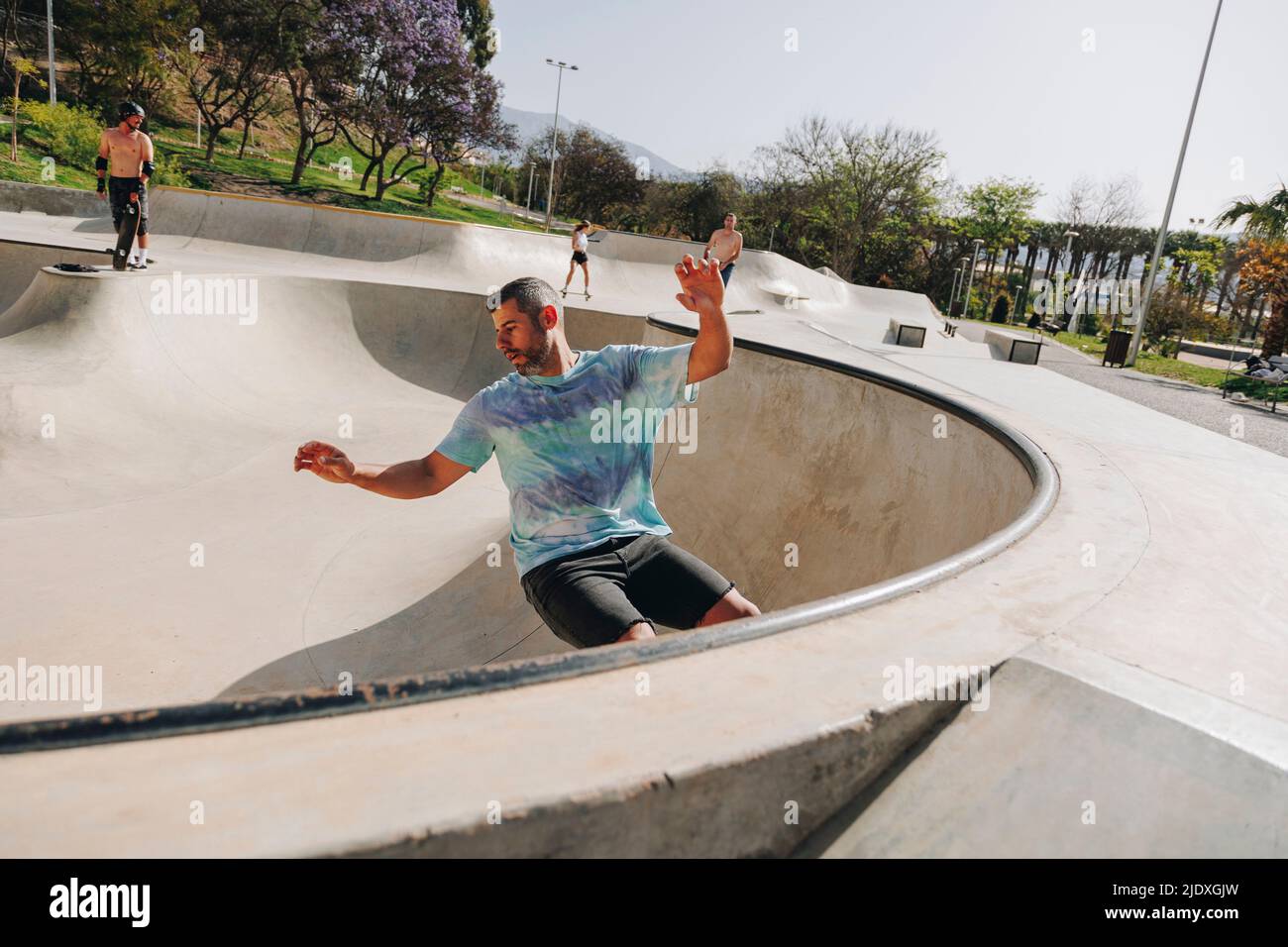 Young man skateboarding in skatepark hi-res stock photography and ...
