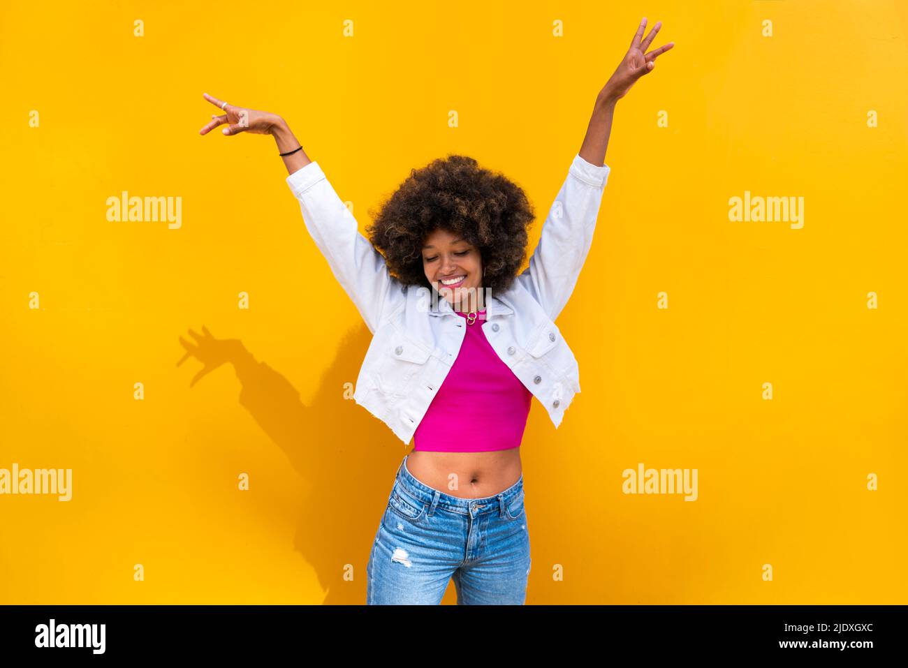 Joyful woman standing hands hi-res stock photography and images - Alamy