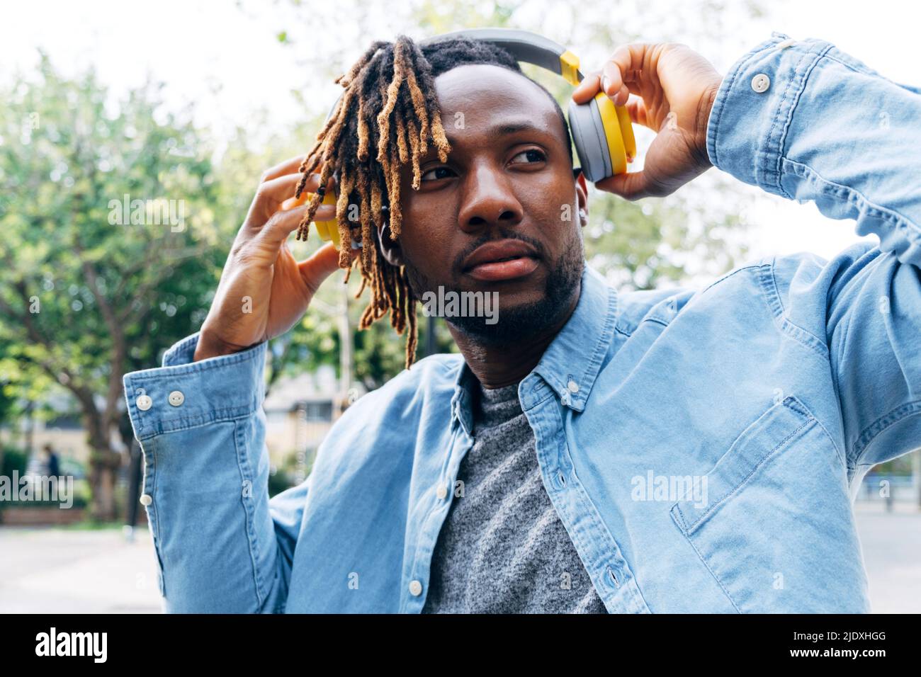 African american man wearing wireless hi-res stock photography and ...