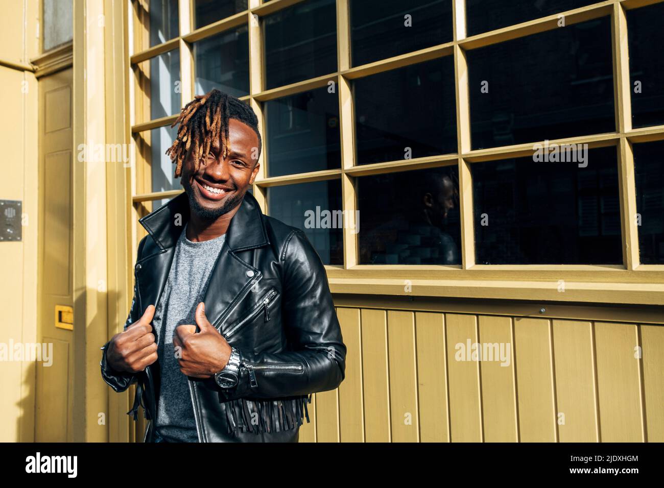 Male in leather jacket hi-res stock photography and images - Alamy