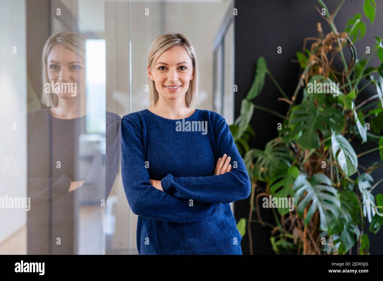Portrait of confident businesswoman in office Stock Photo