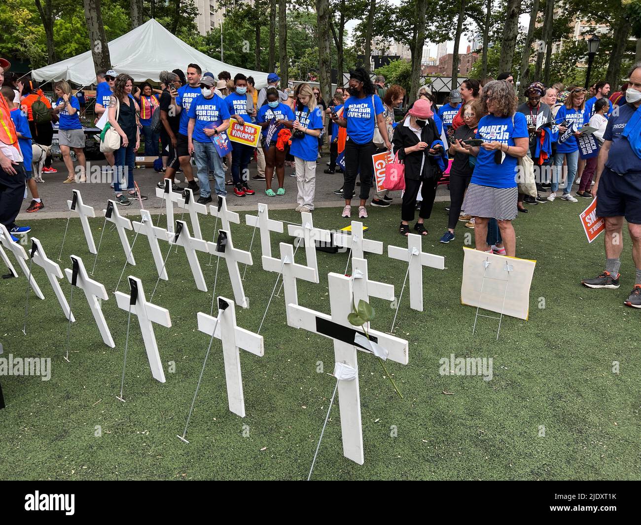 'March For Our Lives' demonstration and march across the Brooklyn Bridge from Cadman Plaza, Brooklyn to City Hall speaking out for substantive gun laws to protect children and all citizens after recent mass shootings and slaughter around the United States. Crosses identifying children killed at the Evalde school in Texas. Stock Photo