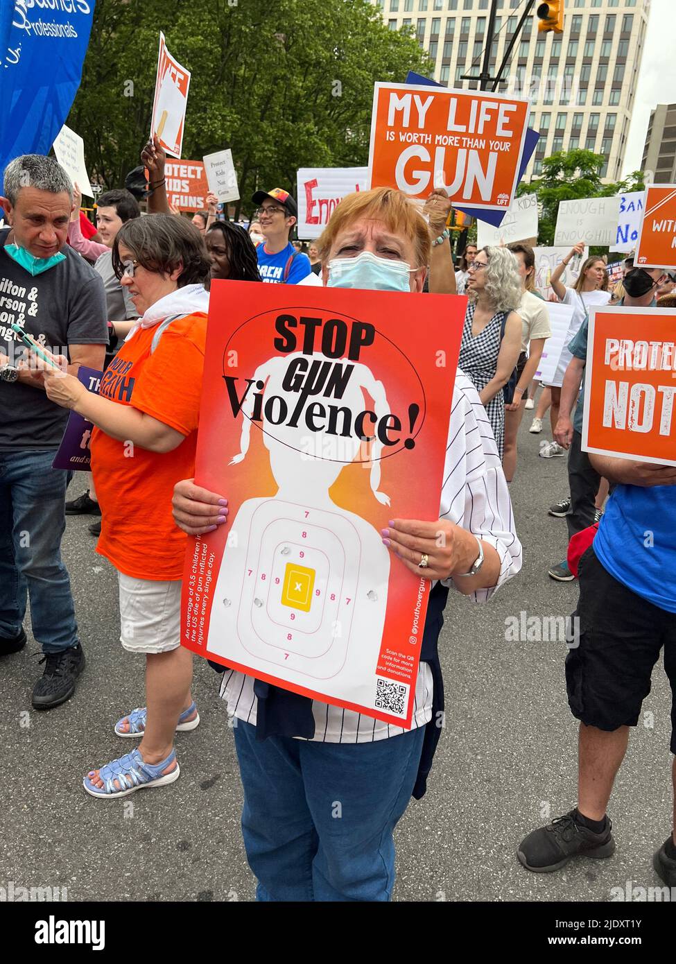 'March For Our Lives' demonstration and march across the Brooklyn Bridge from Cadman Plaza, Brooklyn to City Hall speaking out for substantive gun laws to protect children and all citizens after recent mass shootings and slaughter around the United States. Stock Photo