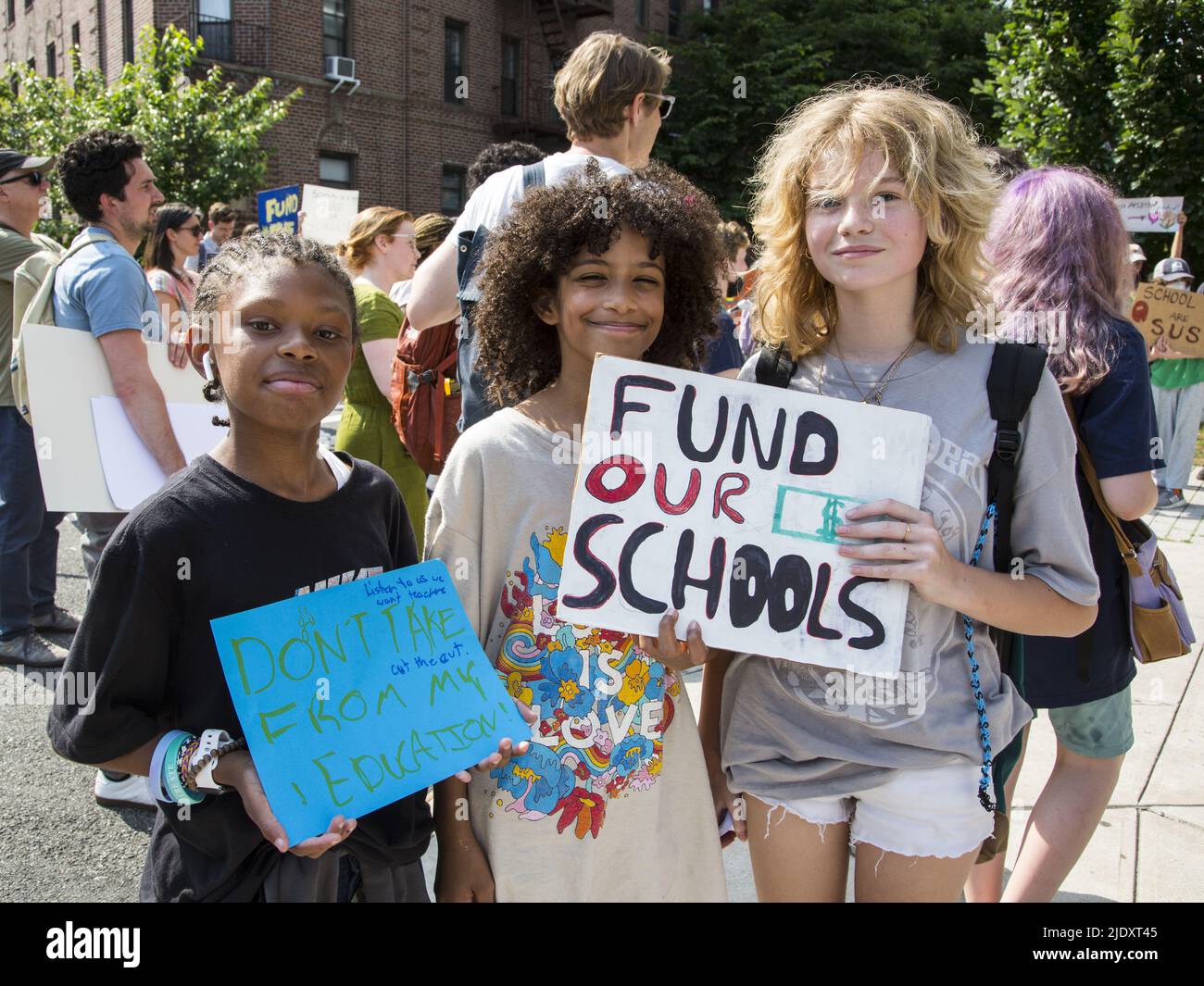 Teachers, students and parents demonstrate in front of a public school in Windsor Terrace in Brooklyn against Mayor Adams new school budget cuts after just emerging emerging from the difficult Covid-19 Pandemic. Stock Photo