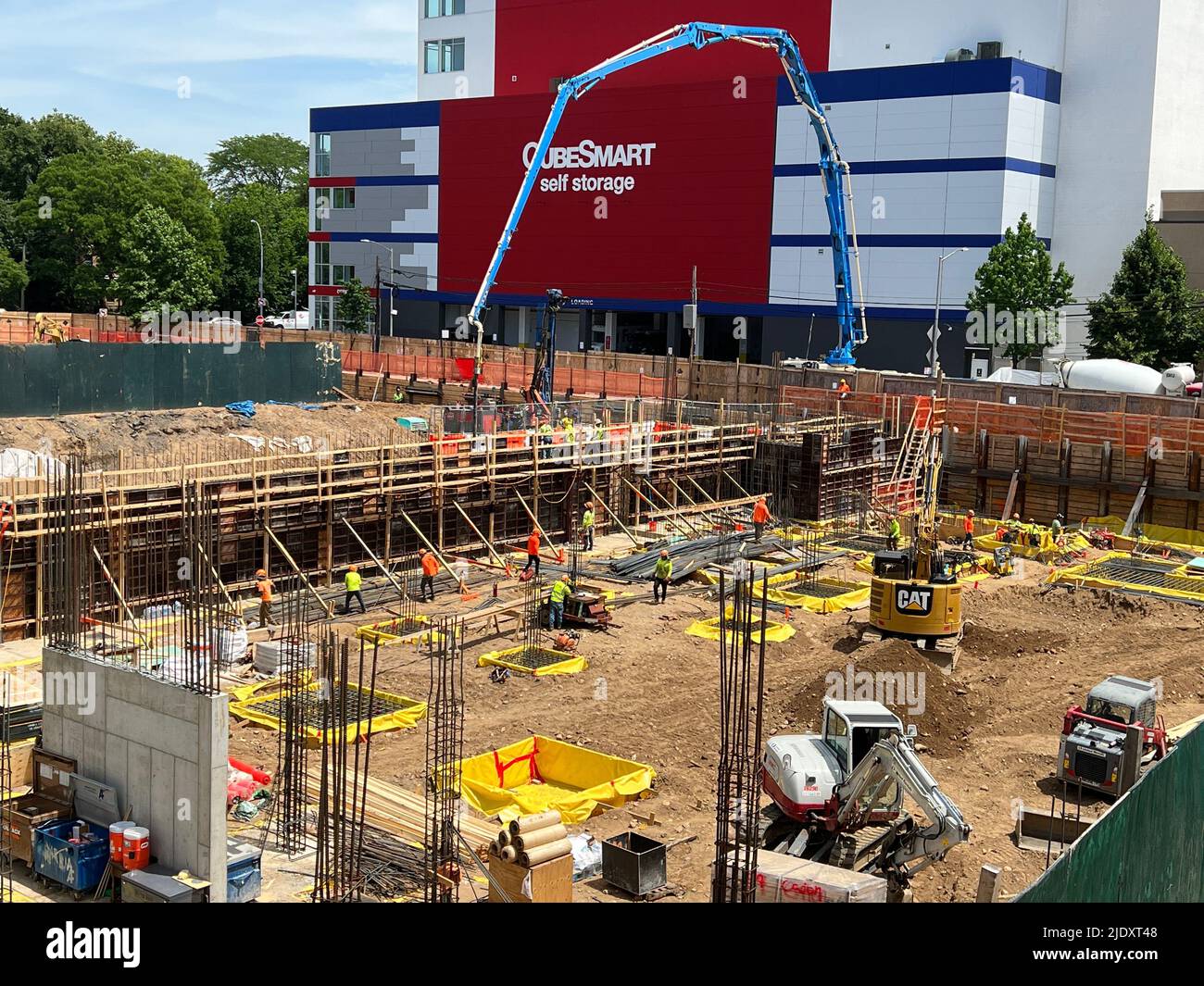 Looking down on a large apartment building construction site near