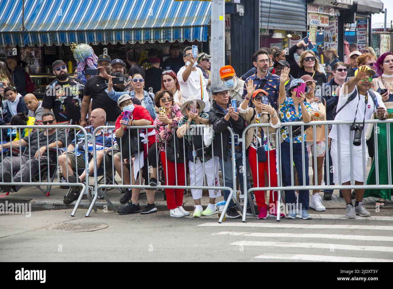 After 2 years from a Covid-19 shutdown, people return to the annual Mermaid Parade, alleged to be the largest art parade in the nation, at Coney Island along Surf Avenue in Brooklyn, New York. Stock Photo