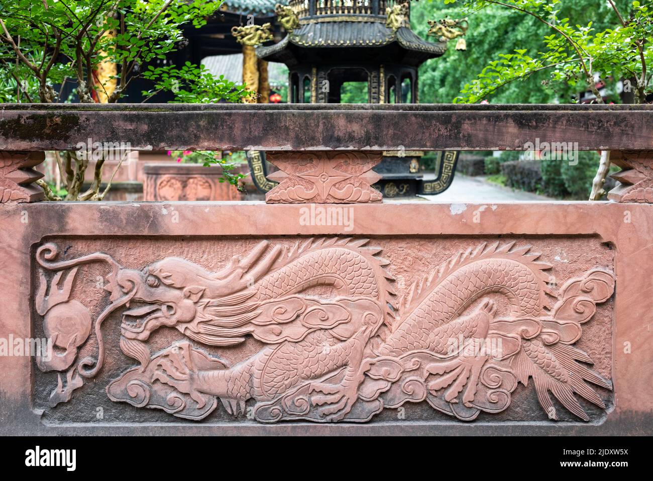 Bas-relief of a dragon on a wall in a taoist temple Stock Photo