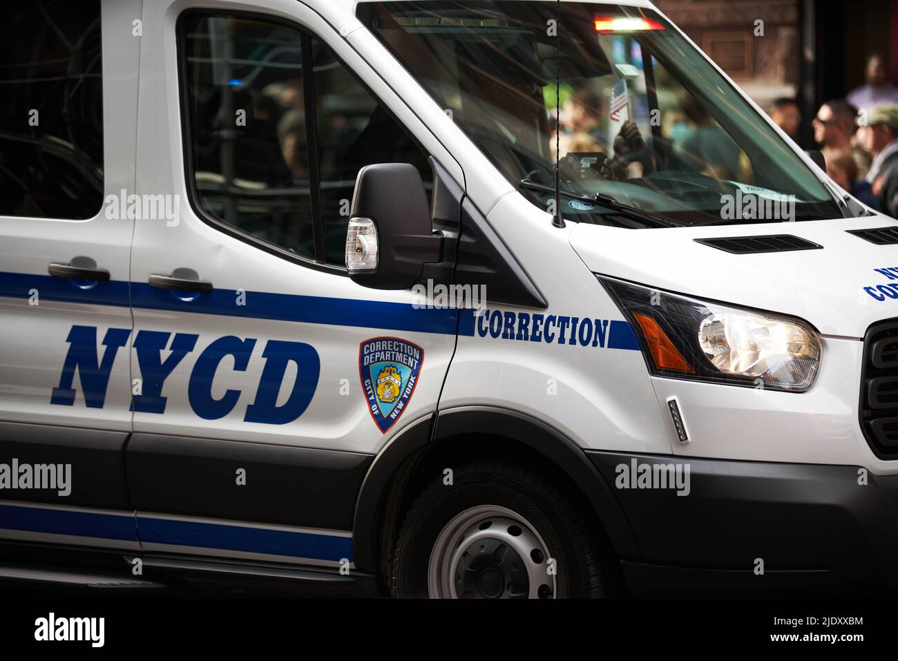Manhattan, USA - 11. November 2021: New York Corrections Department van in Manhattan, transporting inmates to prison. Veterans day parade NYCD showing Stock Photo