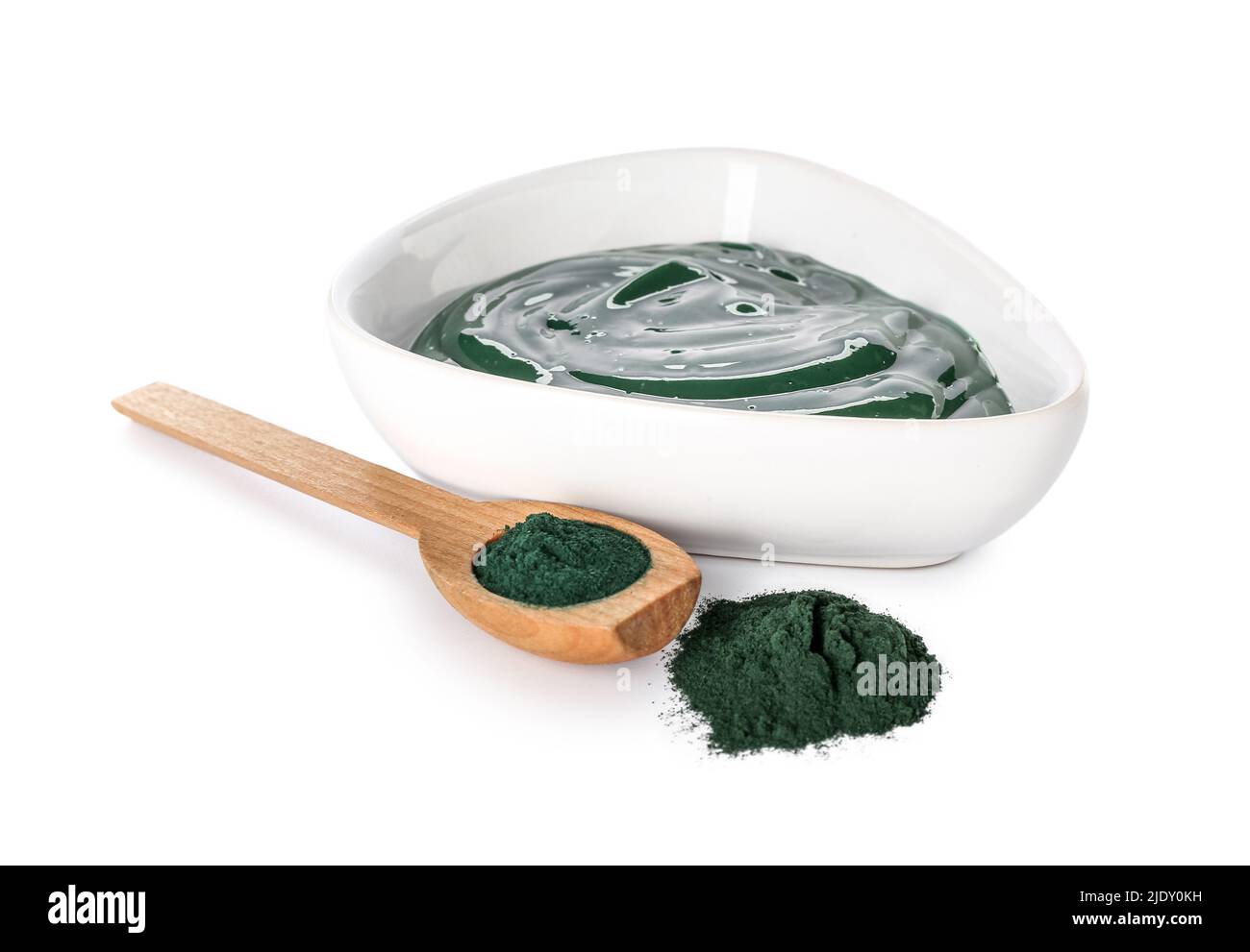 Bowl of spirulina facial mask and powder on white background Stock Photo Alamy