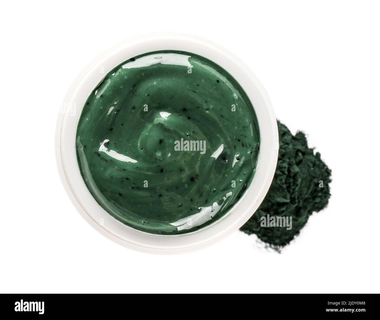 Jar of spirulina facial mask and powder on white background Stock Photo