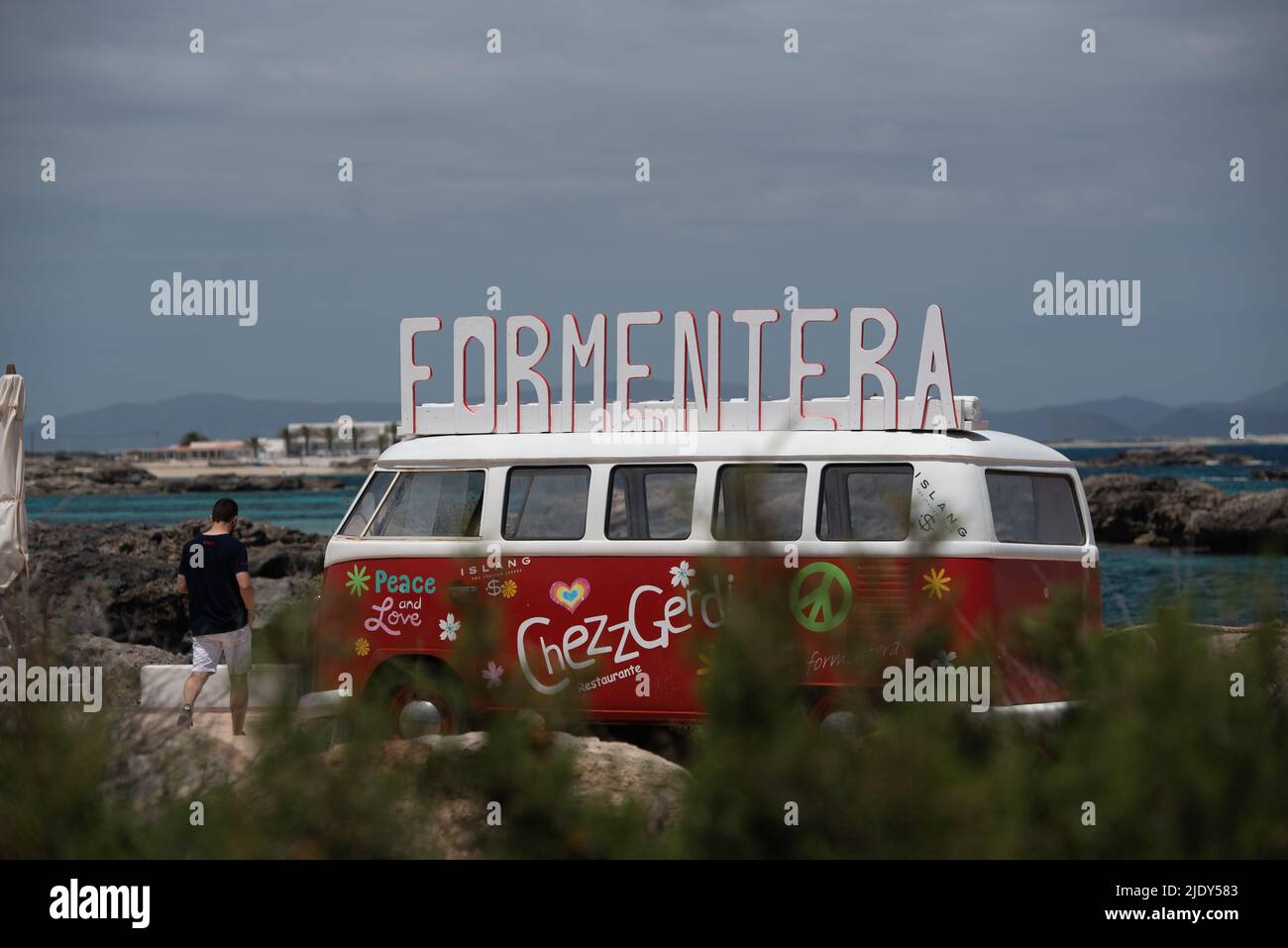 Formentera, Spain: 2021 May 29: Classic German Volkswagen Transporter van on Es Pujols beach in Formentera in the summer of 2021 Stock Photo