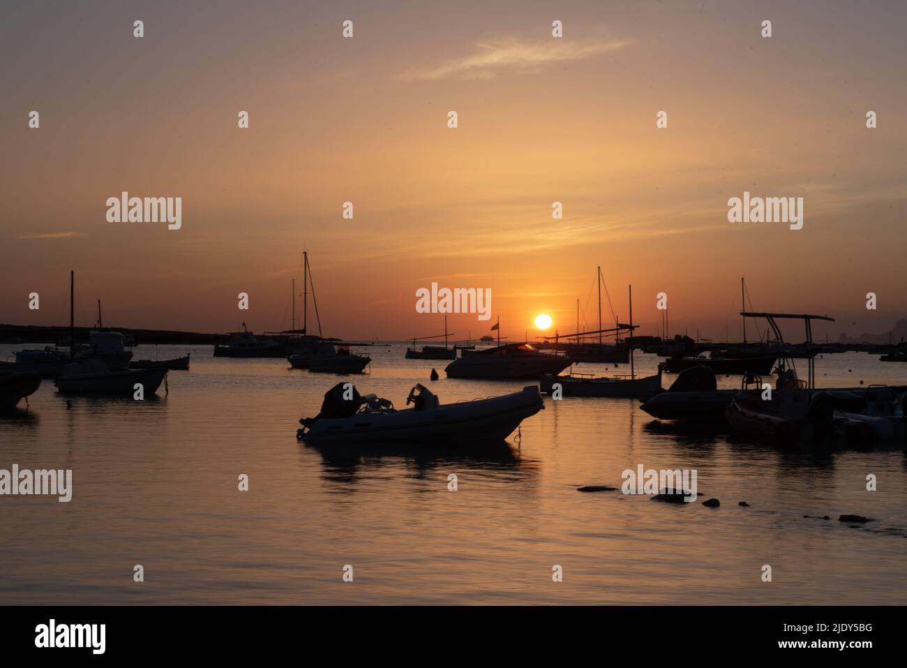 Sunset in the Estany d Es Peix in Formentera, Spain. Stock Photo