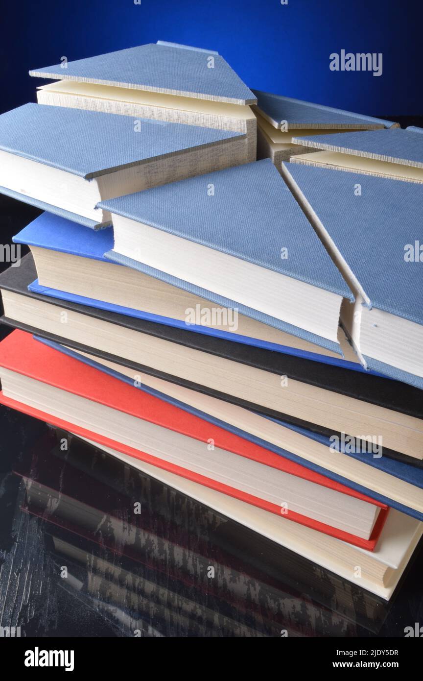 Hardbound book divided into chapters Stock Photo Alamy