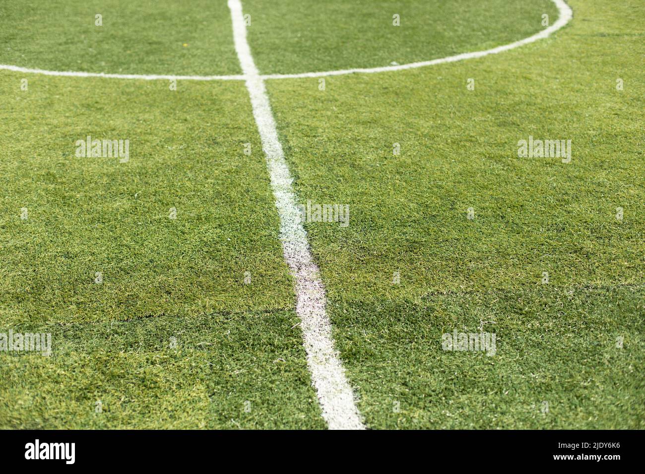 Marking of football field. White stripe on green grass. Stock Photo