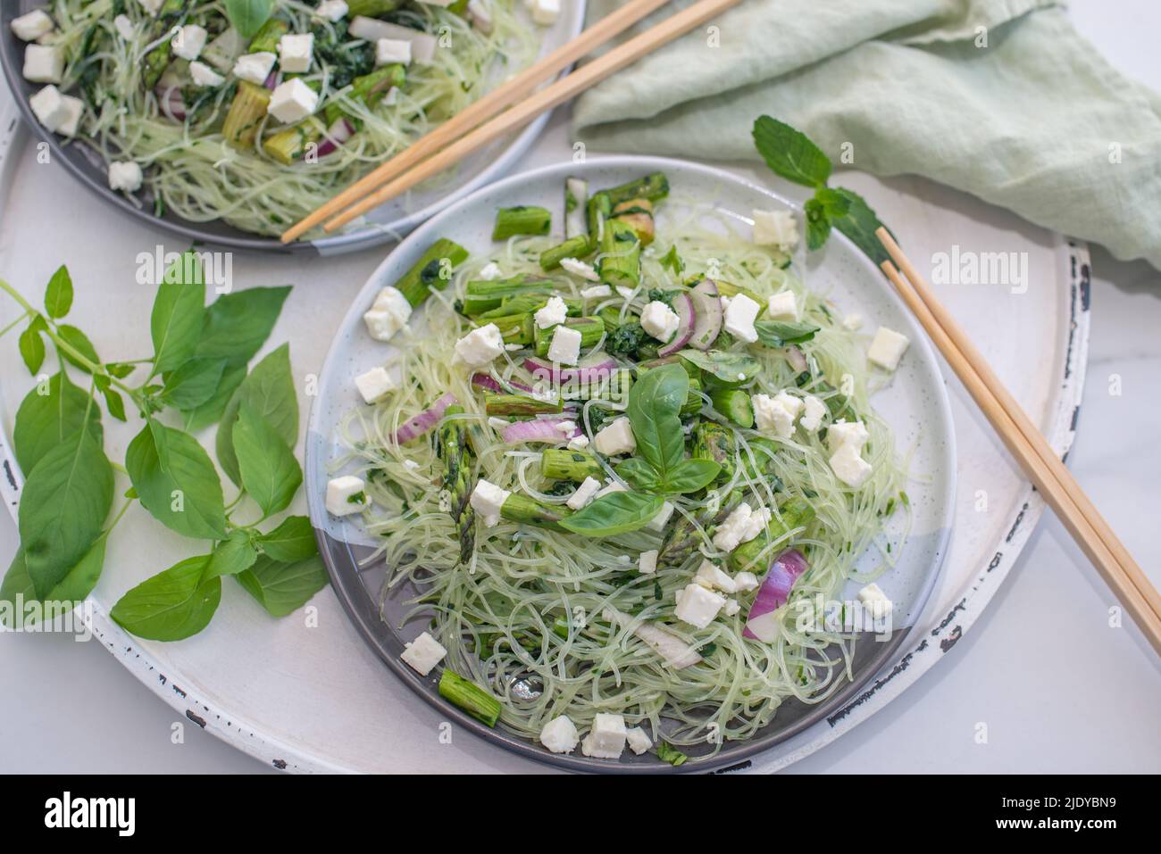 healthy vermicelli noodle salad with fresh herbs and asparagus Stock Photo