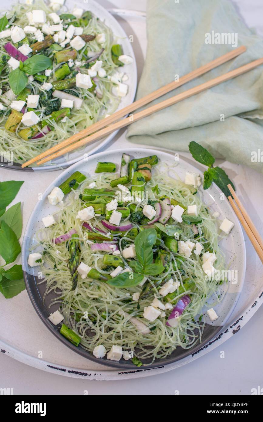 healthy vermicelli noodle salad with fresh herbs and asparagus Stock Photo