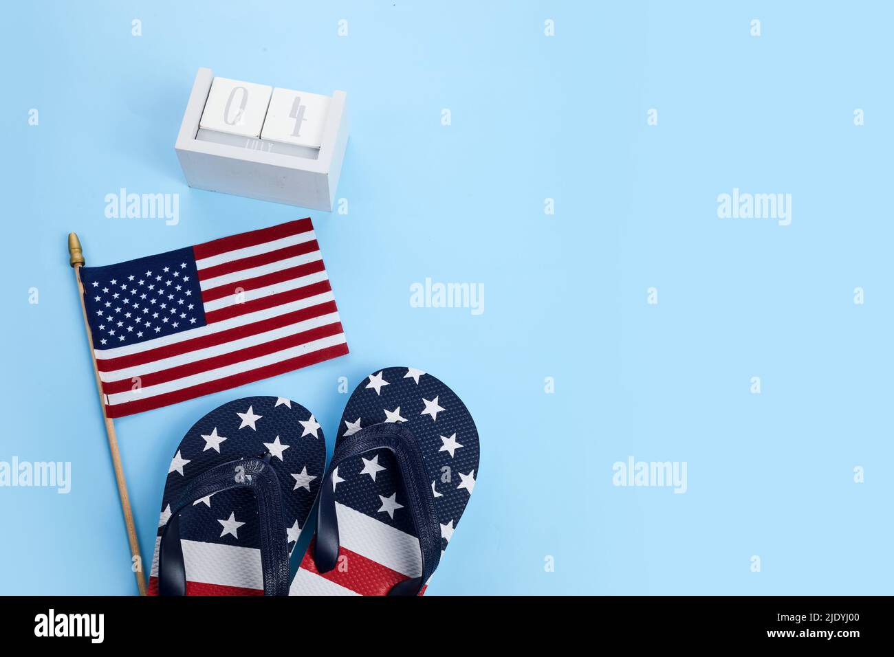 Patriotic USA background with flip flops and American flag Stock Photo