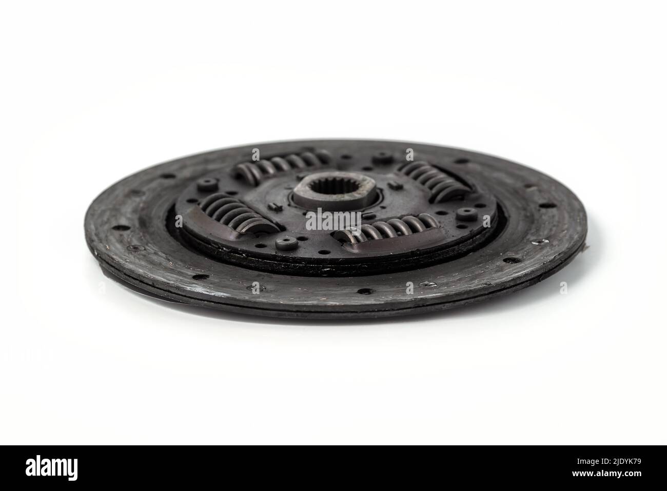Worn old used clutch disc. Part of auto transmission.Isolated on white