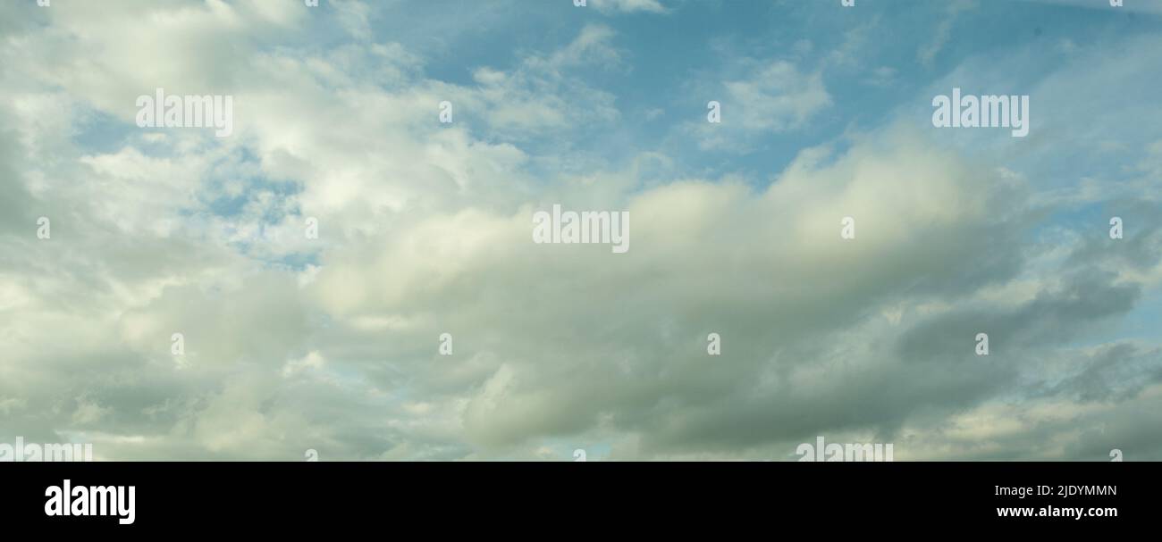 White cumulus clouds in the blue sky background Stock Photo - Alamy
