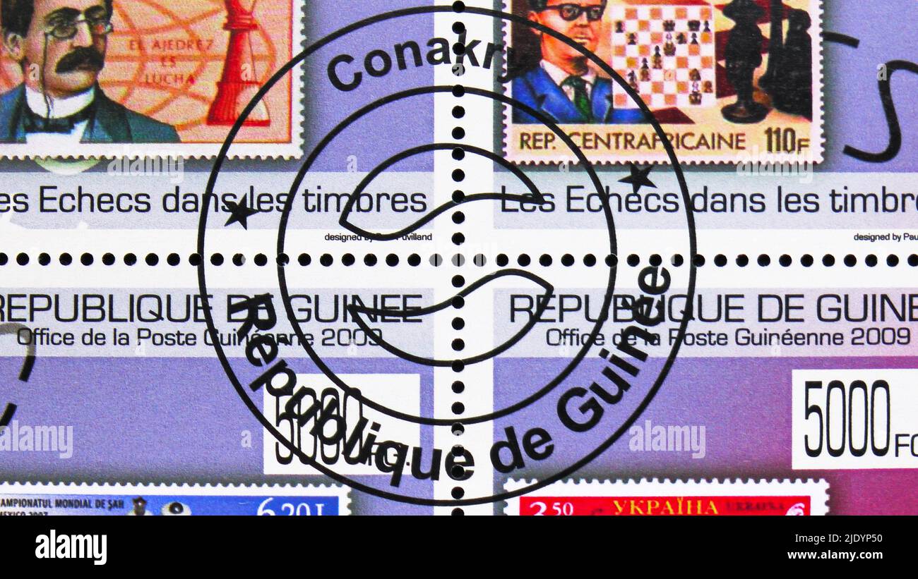 MOSCOW, RUSSIA - JUNE 17, 2022: Postage stamp printed in Guinea shows Conakry Post office mark, Chess on stamps serie, circa 2009 Stock Photo