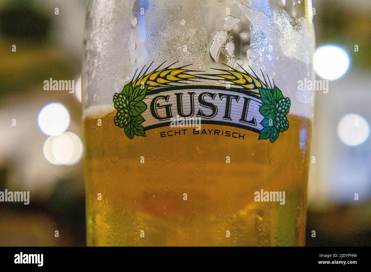 The half litre glass of Gustl beer in Burgerbrau Brewery Inn in spa town of Bad Reichenhall, Berchtesgadener Land district, Upper Bavaria, Germany, on Stock Photo