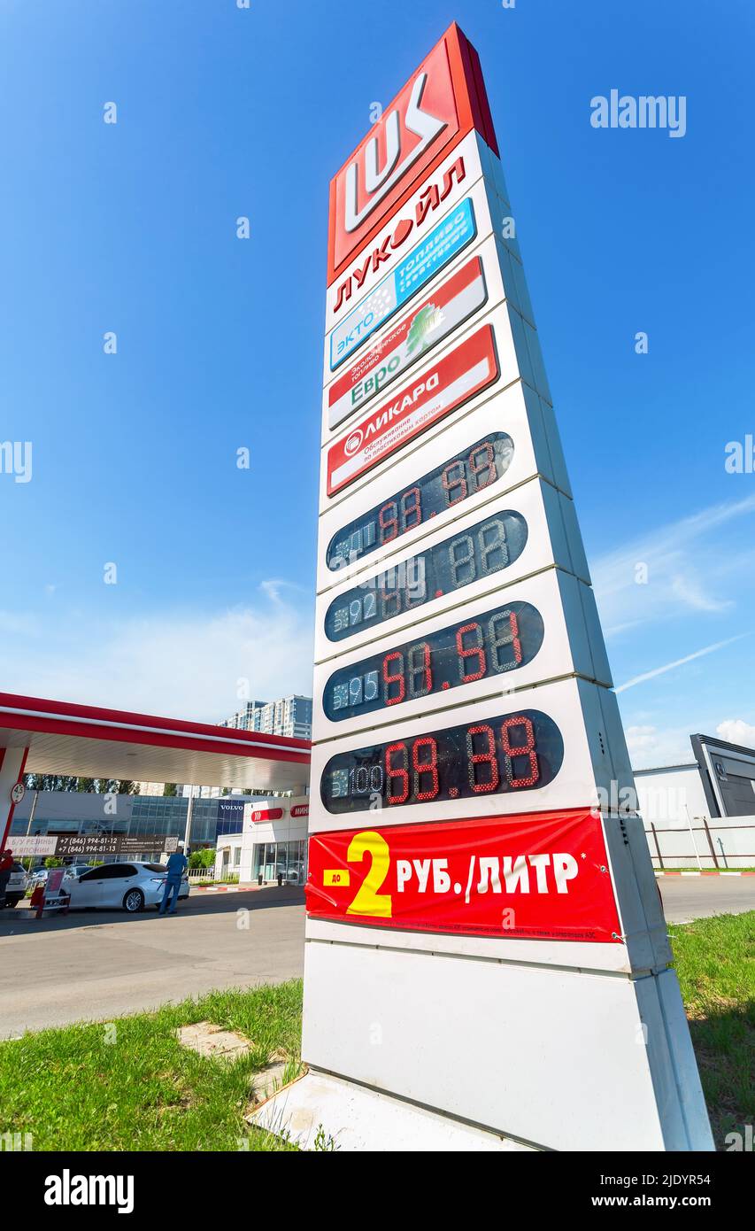 Samara, Russia - June 18, 2022: Guide sign, indicated the price of the fuel on the Lukoil gas station. Lukoil is one of the largest russian oil compan Stock Photo