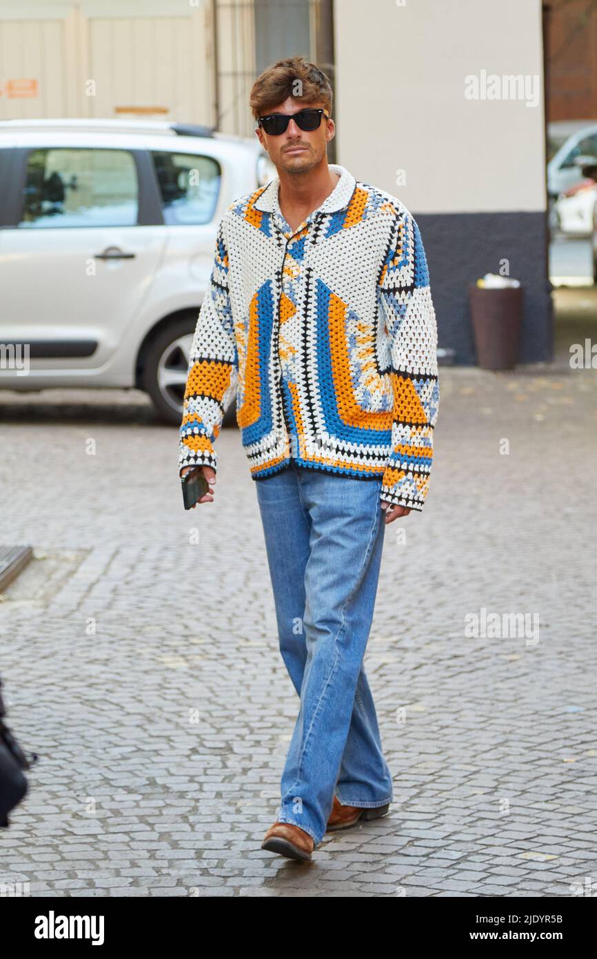 MILAN - JUNE 18: Man with brown Louis Vuitton bag and blue Gucci jacket  with yellow edge before Giorgio Armani fashion show, Milan Fashion Week  street Stock Photo - Alamy