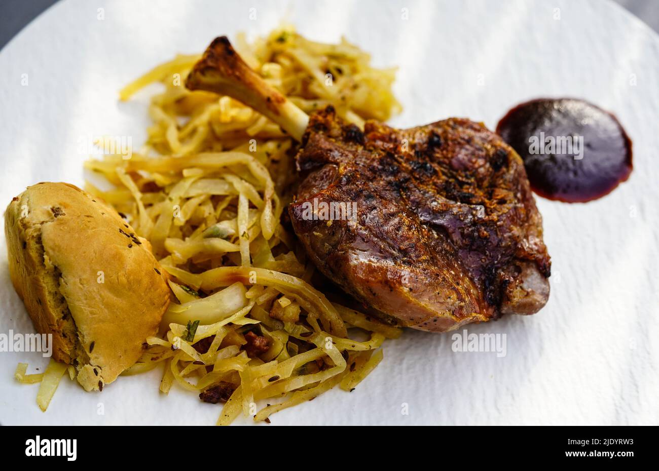 grilled pig wings sliced open pork knuckle of a young pig Stock Photo