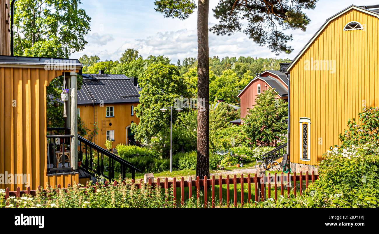 Wooden buildings in the Puu-Käpylä area of Helsinki, Finland in summer. Stock Photo