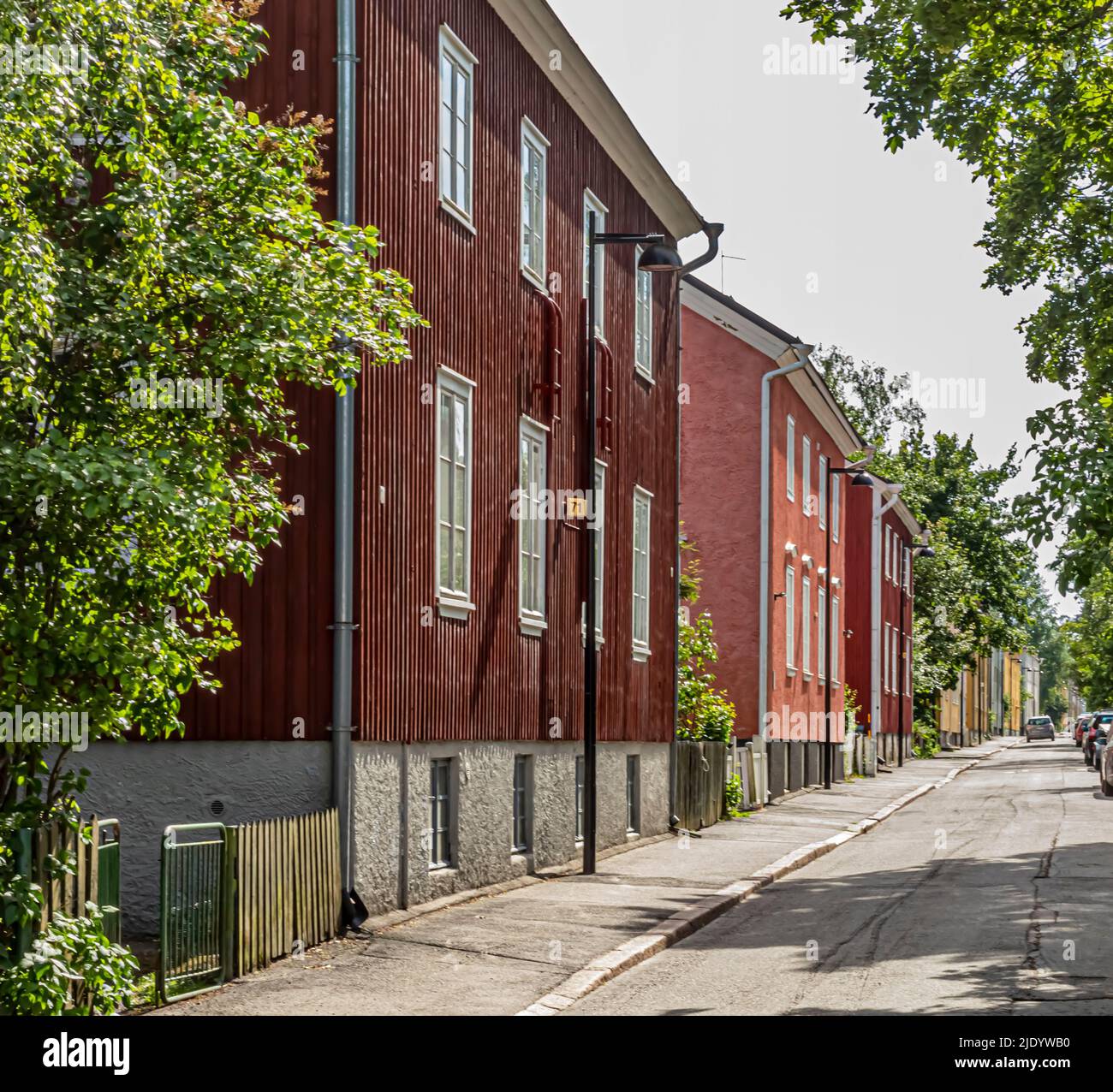 Wooden buildings in the Kumpula area of Helsinki, Finland in summer. Stock Photo