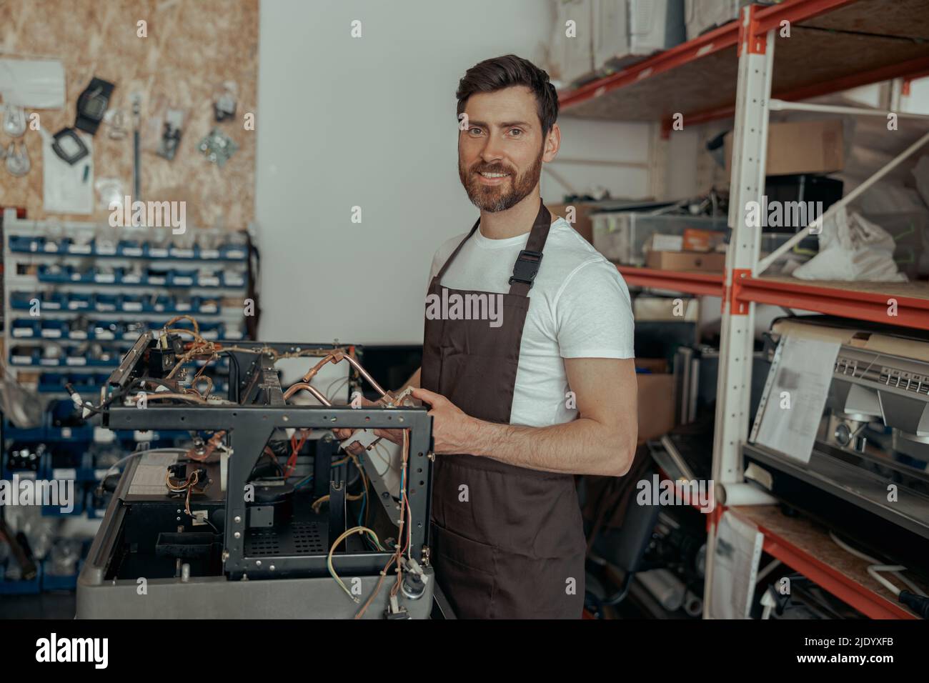 Repairman screwdriver fixing coffee hi-res stock photography and images ...