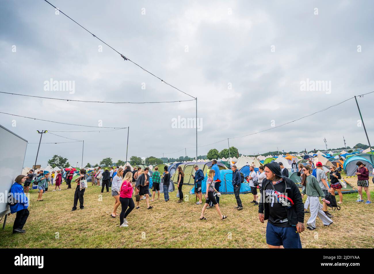 Glastonbury, UK. 24th June, 2022. Queueing for showers is standard