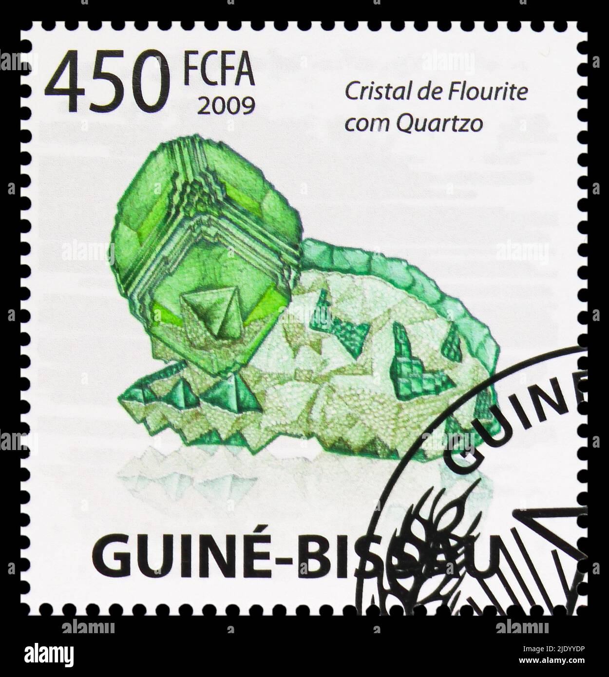 MOSCOW, RUSSIA - JUNE 17, 2022: Postage stamp printed in Guinea-Bissau shows Flourite Crystal with Quartz, Minerals serie, circa 2009 Stock Photo