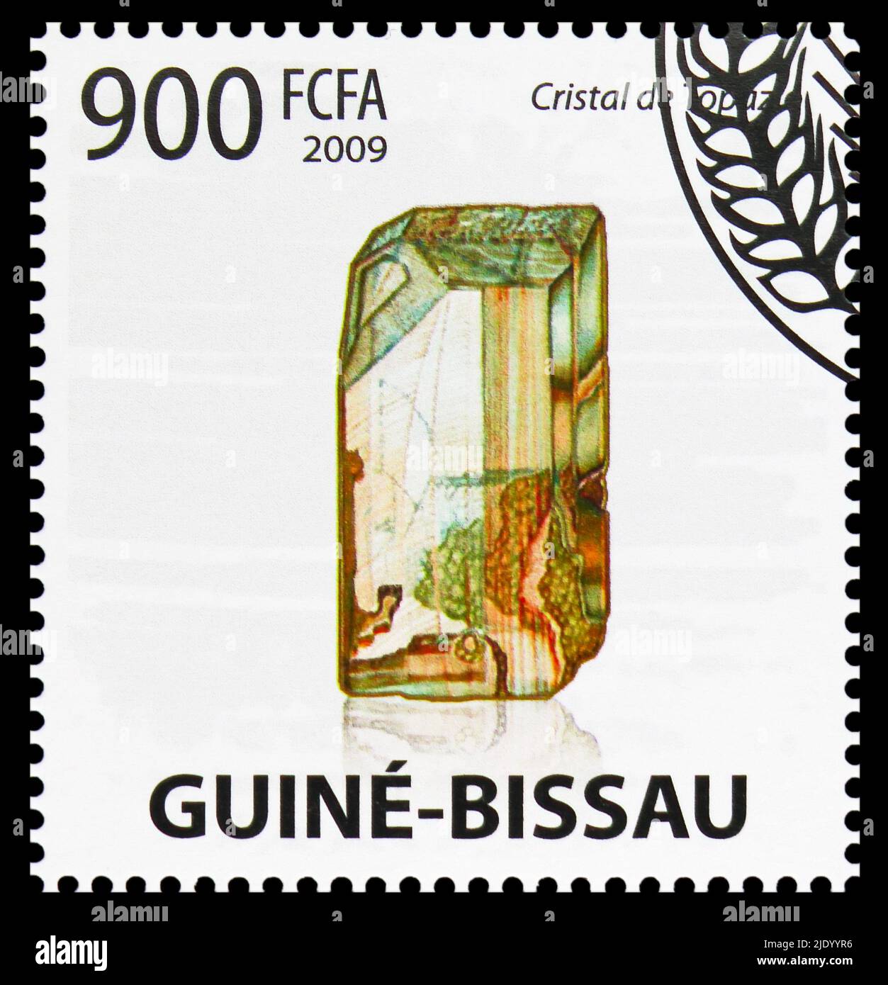 MOSCOW, RUSSIA - JUNE 17, 2022: Postage stamp printed in Guinea-Bissau shows Crystal of Topaz, Minerals serie, circa 2009 Stock Photo