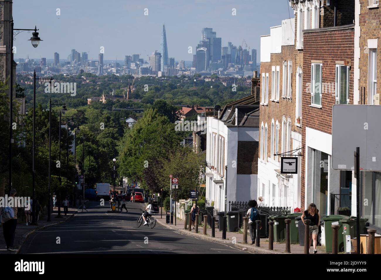 Pedestrians and traffic on Gypsy Hill in south London, on 22nd June 2022, in London, England. Stock Photo